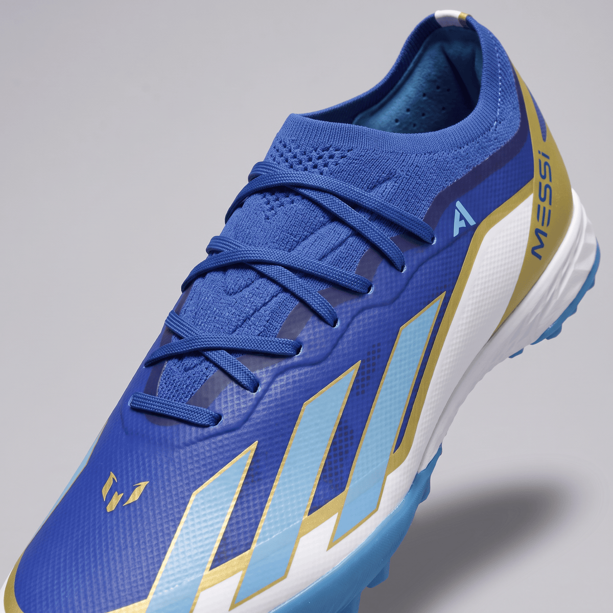 X Crazyfast.1 TF Shock Blue / Zero Metallic / Core Black