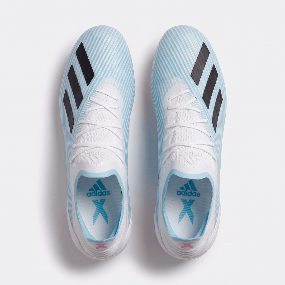 X 19.1 FG Footwear White / Core Black / Cyan