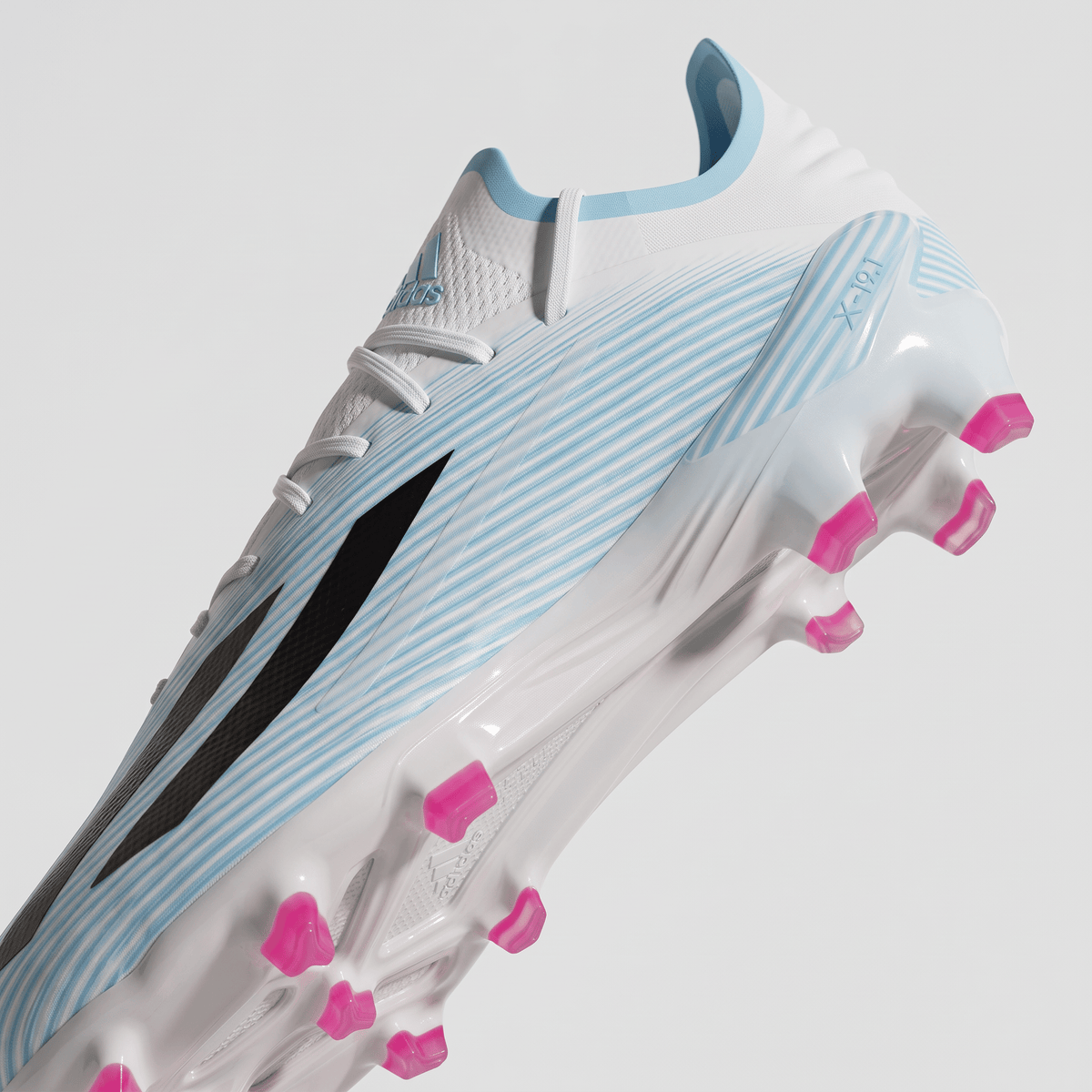 X 19.1 FG Footwear White / Core Black / Cyan