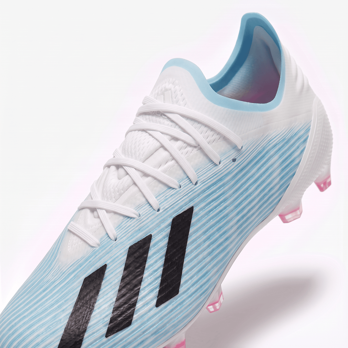 X 19.1 FG Footwear White / Core Black / Cyan