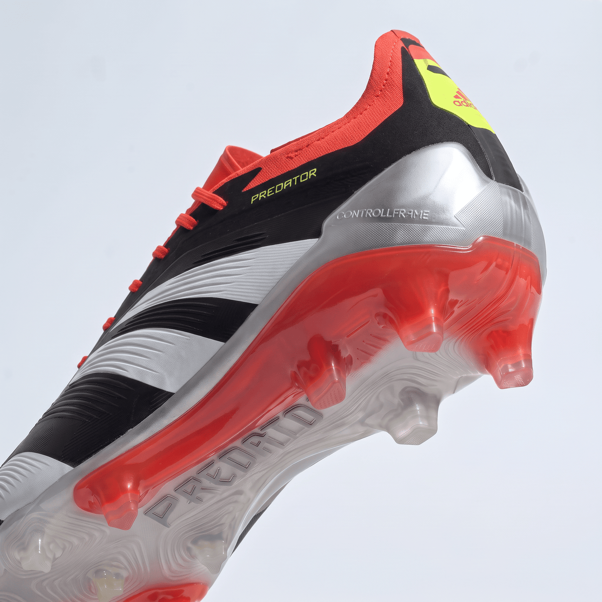 Predator FG Core Black / Footwear White / Solar Red