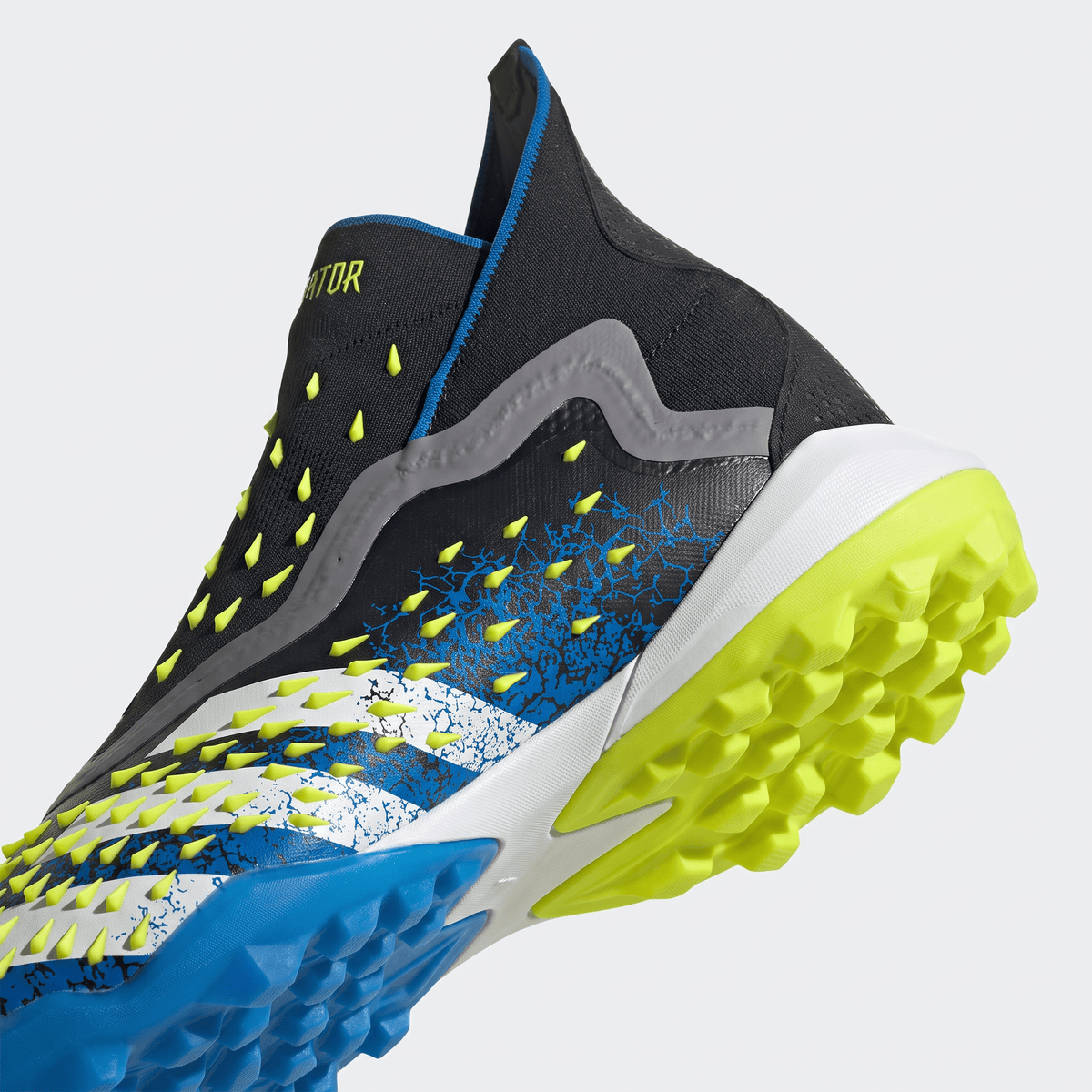 Predator Freak+ TF Core Black / Cloud White / Team Royal Blue / Solar Yellow