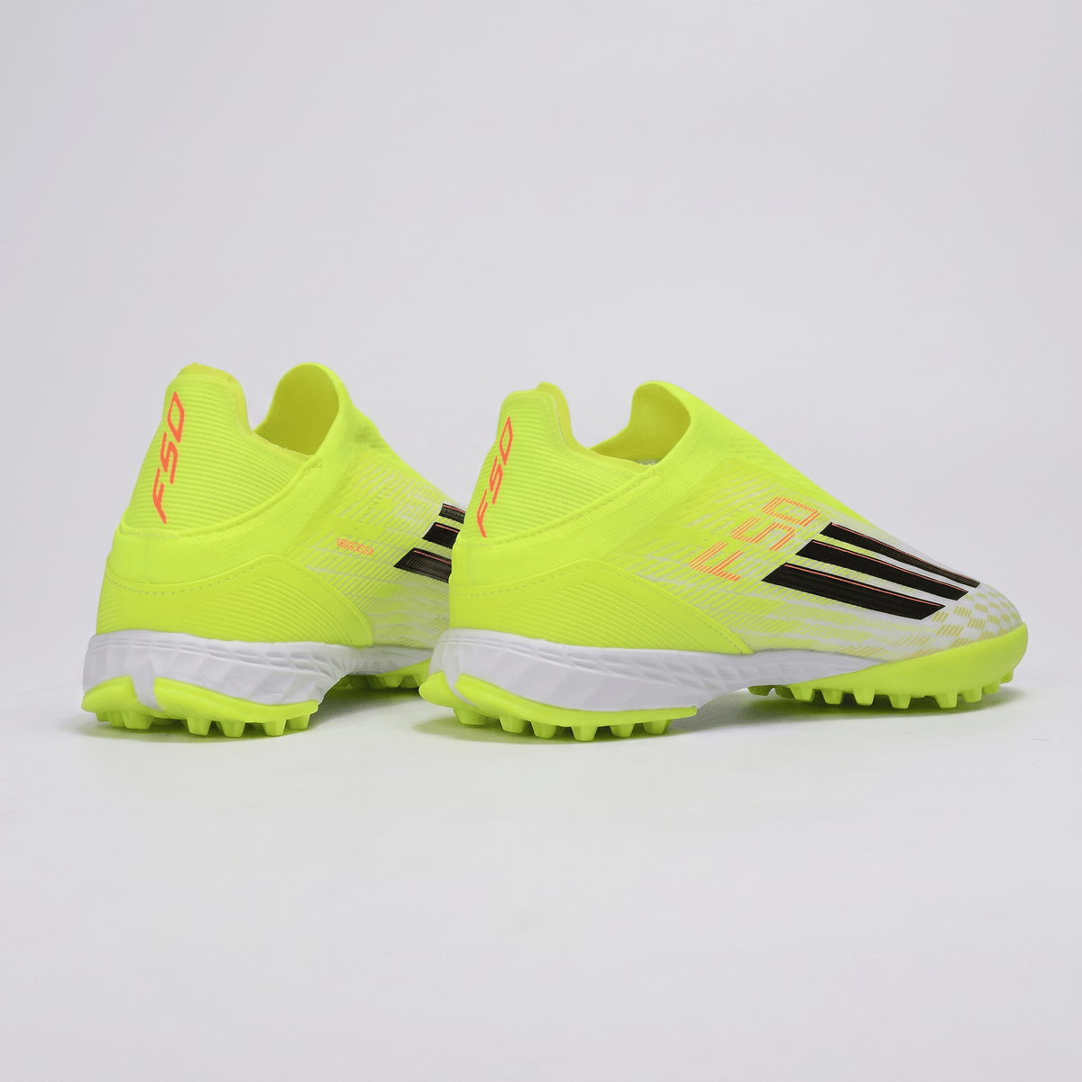 F50 Laceless TF Solar Yellow / Core Black / Lucid Red