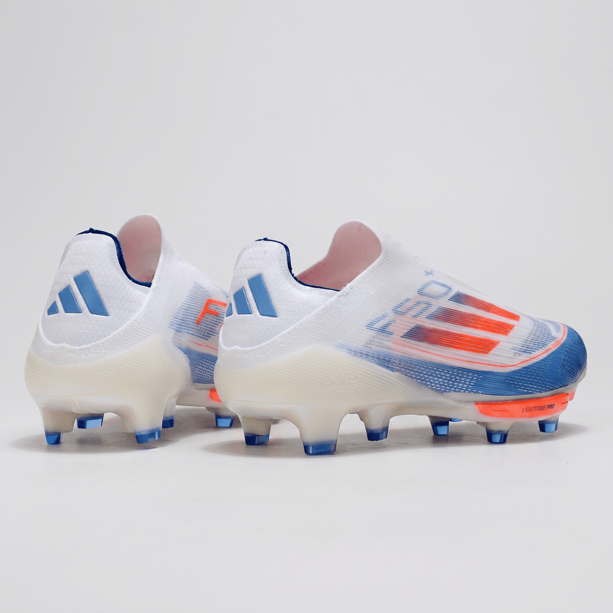 F50 Laceless FG Footwear White / Solar Blue / Solar Red