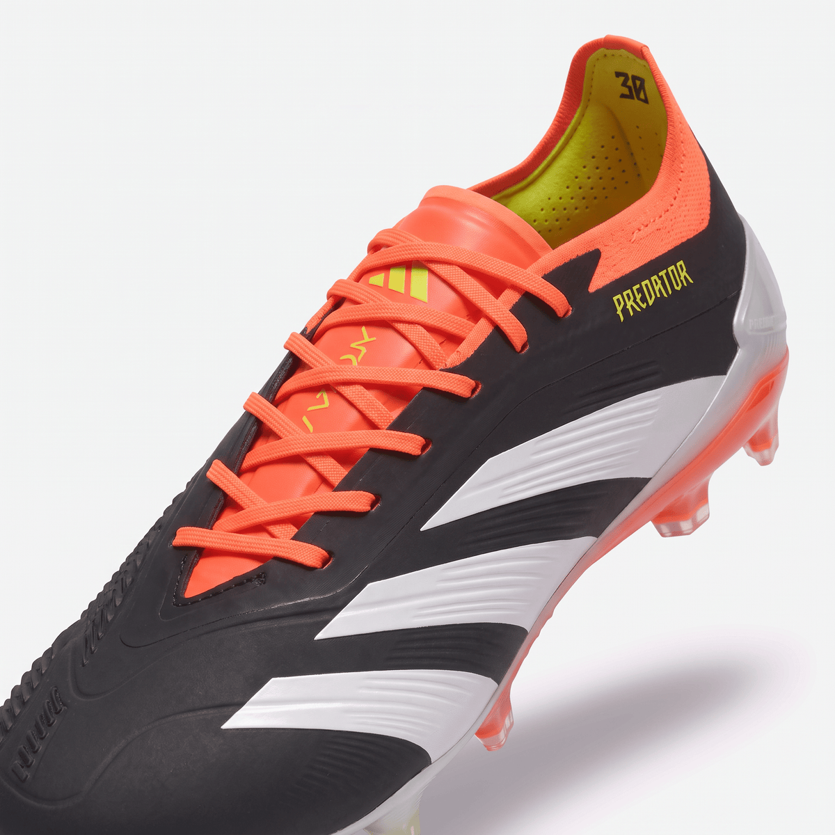 Predator FG Core Black / Footwear White / Solar Red