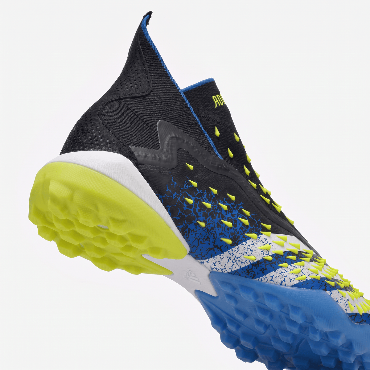 Predator Freak+ TF Core Black / Cloud White / Team Royal Blue / Solar Yellow