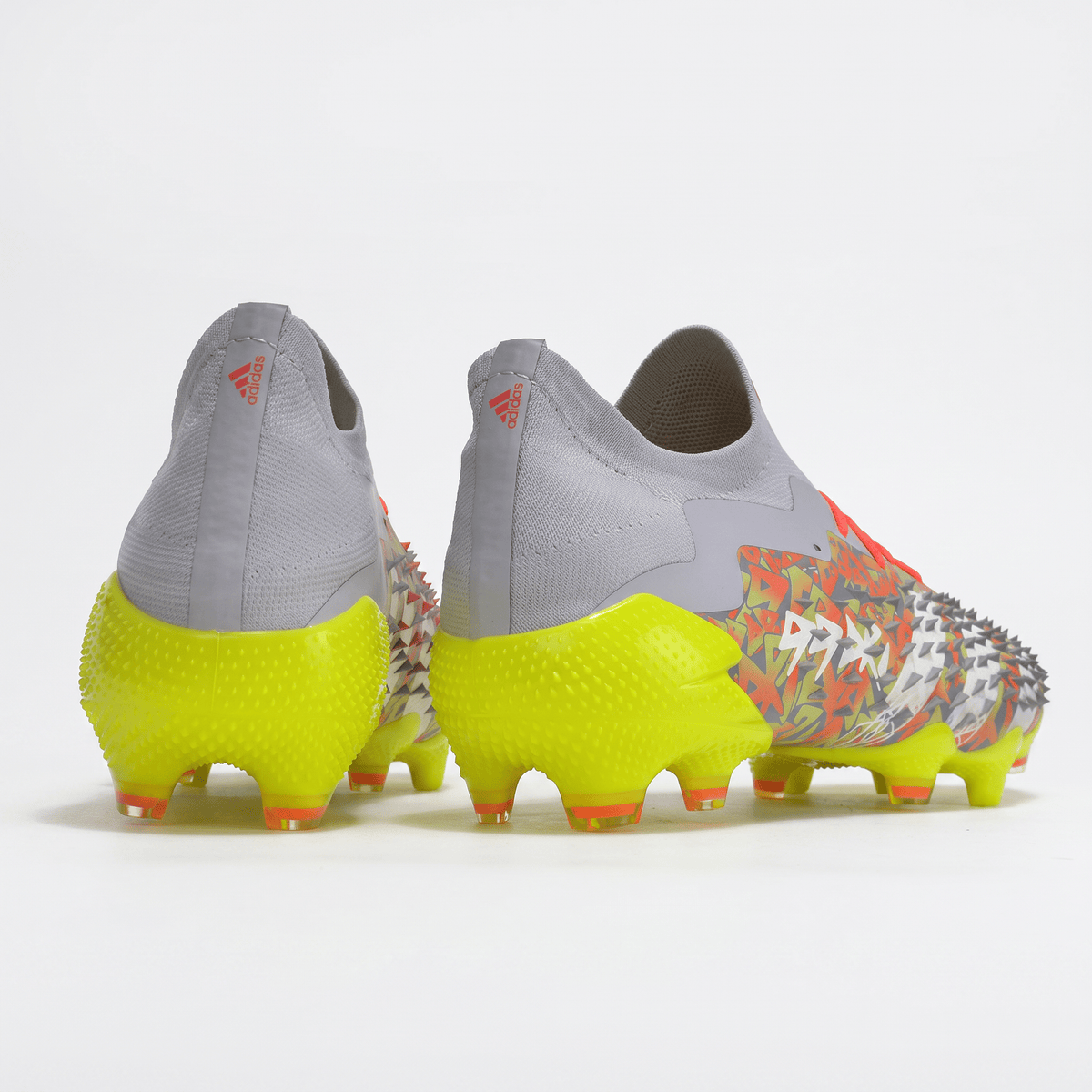 Predator Freak.1 FG Clear Grey / Footwear White / Solar Yellow / Solar Red
